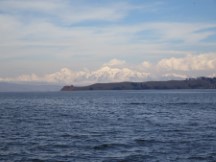 Snow covered mountains seen from Lake Titicaca near Copacabana, Bolivia.