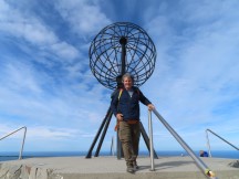 Ted at the Nordkapp globe monument at the northern most point in Europe.