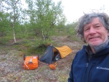 Ted with his bike at his campsite 10 miles before Kautokeino, Norway. It was a cold night, Ted did not have a warm sleeping bag,