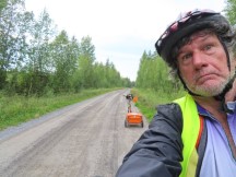 Ted with his bike on road required to avoid E4, near Skogså, Sweden.