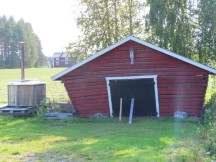 Leaning barn near Fällfors, Sweden.