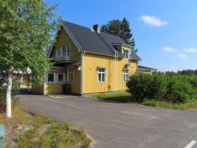 House near Fällfors, Sweden. Lots of the homes had ladders like this connected to the house to clean the chimneys.
