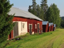 Leaning building on farm between Fällfors, Sweden and Kåge, Sweden.