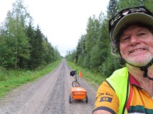 Road just south of Bygdsiljum, Sweden.  It went from dirt to deep gravel, slowest flat road for cycling on this trip.