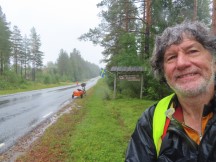 Ted with his bike on road between Sanabadets, Sweden and Umeå, Sweden.