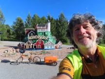 Ted with his bike at visitor information rest stop in Nordingrå, Sweden.