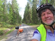 Ted with his bike on roads between Ullånger, Sweden and Bjärtrå, Sweden.