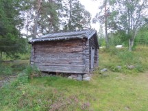 Historic log building near Lövhällan trail on outskirts of Härnösand, Sweden. (Länsmuseets Sjöbodar)