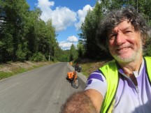 Ted with his bike on road between Stigsjö, Sweden and Åsäng, Sweden.