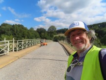 Ted with his bike on road portion of GPS route between Leipzig and Gera, Germany.