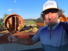Ted in front of the wine barrel shaped cabin he stayed at in Kirchenlamitz.