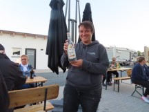 The other camp manager providing shots with dinner at the campground in Kirchenlamitz, Germany.