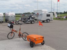 Ted's bike near Motorcycle pulling a camper trailer in Sweden.