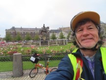 Ted with his bike near statue in Copenhagen, Denmark. 