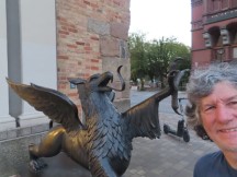 Ted in front of statue in Rostock, Germany.
