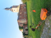 Ted's bike in front of Dorfkirche Zabakuck, Germany.