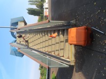 Ted's bike and trailer being taken across bridge in Genthin, Germany.