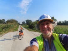 Ted with his bike on a road between Mtzel and Drewitz, Germany.