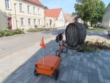 Ted's bike in front of wine barrel between Loburg and Zerbst, Germany.
