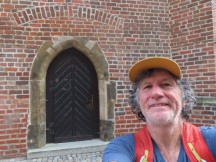 Ted in front of a door in the historic district of Dessau, Germany.